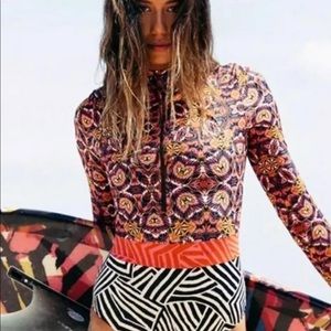 Long sleeve rash guard one piece swimsuit.